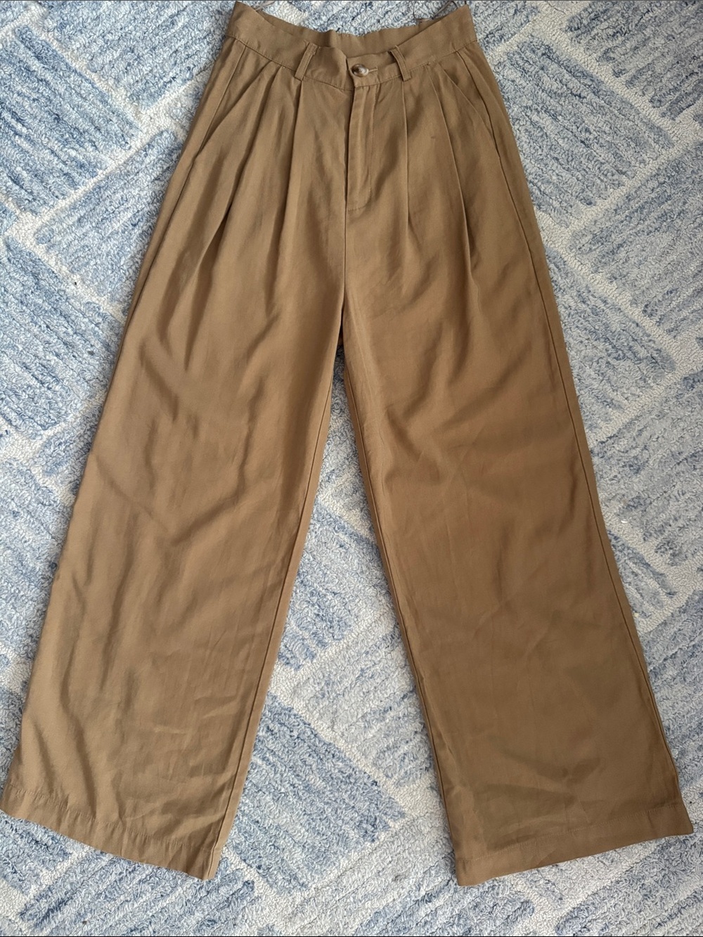 Miou Muse Wide-Leg Pleated Trousers in a tan brown high waisted